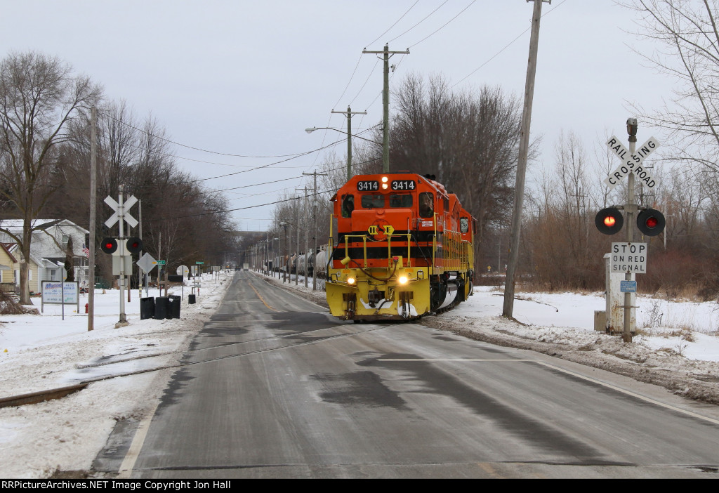 HESR 3414 starts across Carrollton Rd as it continues its slow roll south with 702